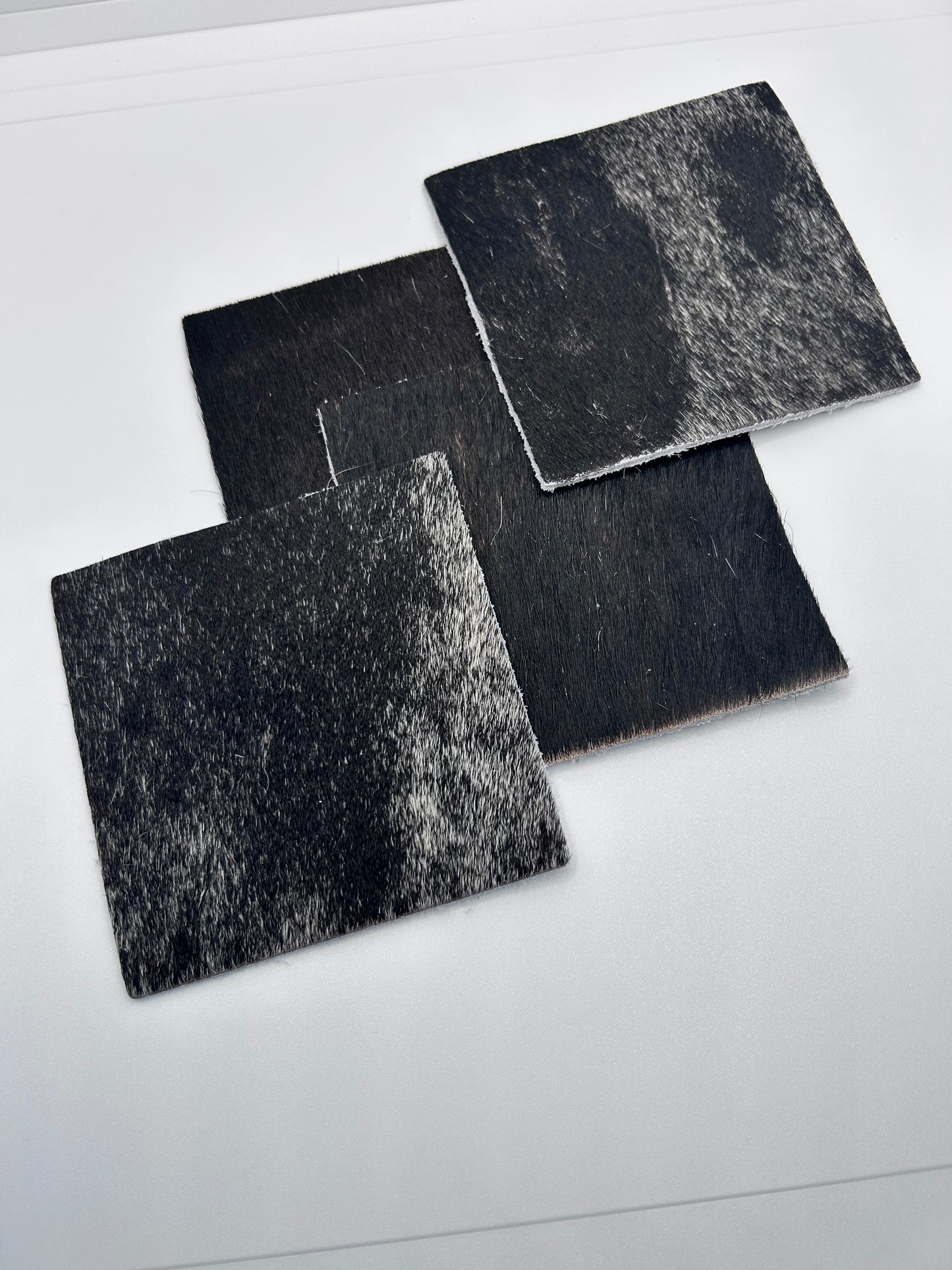 Bold Contrast Leather Coasters – Primarily Black